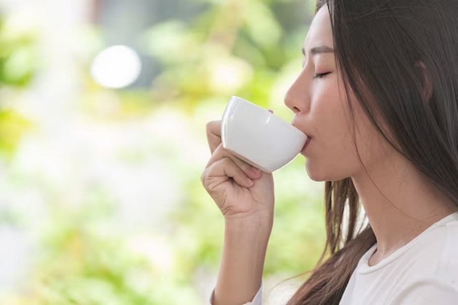 Female sipping coffee