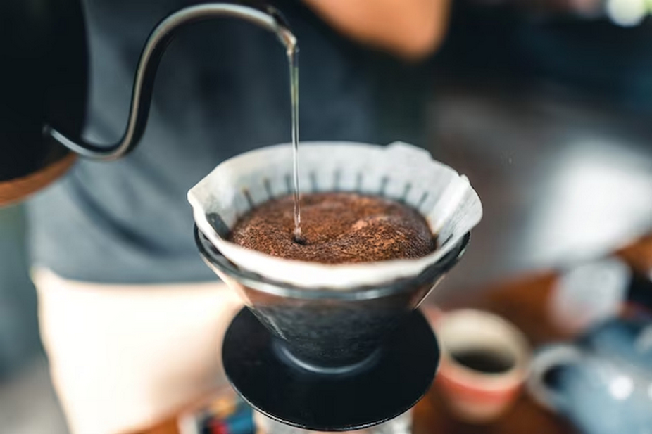 Person making pour-over coffee